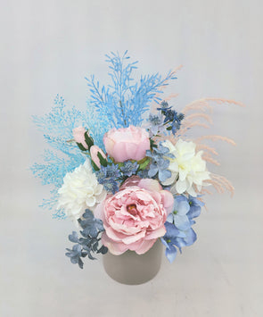 Soft Pastel Pink and Blue Artificial Flower Arrangement In Light Grey Ceramic Pot