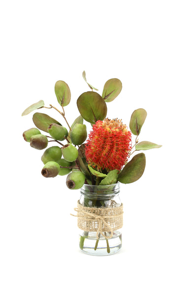 Simple Australian Native Flowers including Banksia, Gumnuts and Eucalptus leaves in a Mason jar